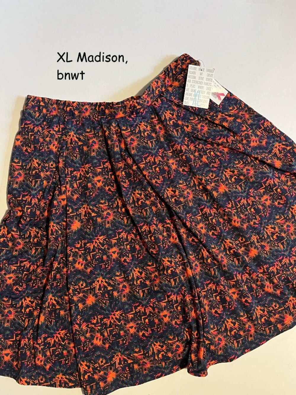 XL Lularoe Madison pleated skirt, orange, red, green blue starburst stripes